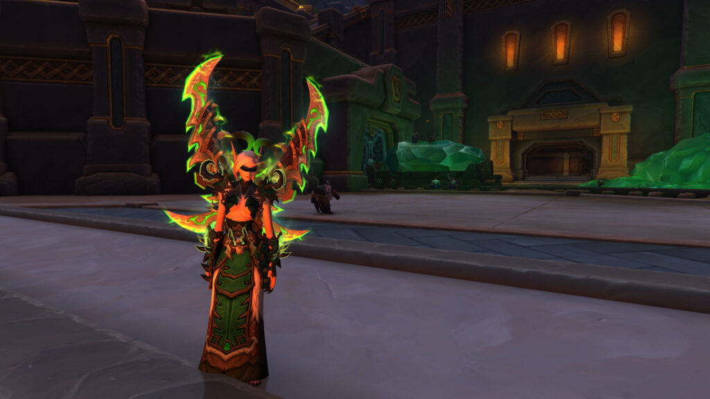 A winged character in green and orange armor